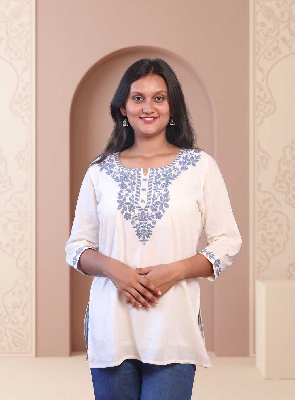 Off white cotton embroidery short kurti